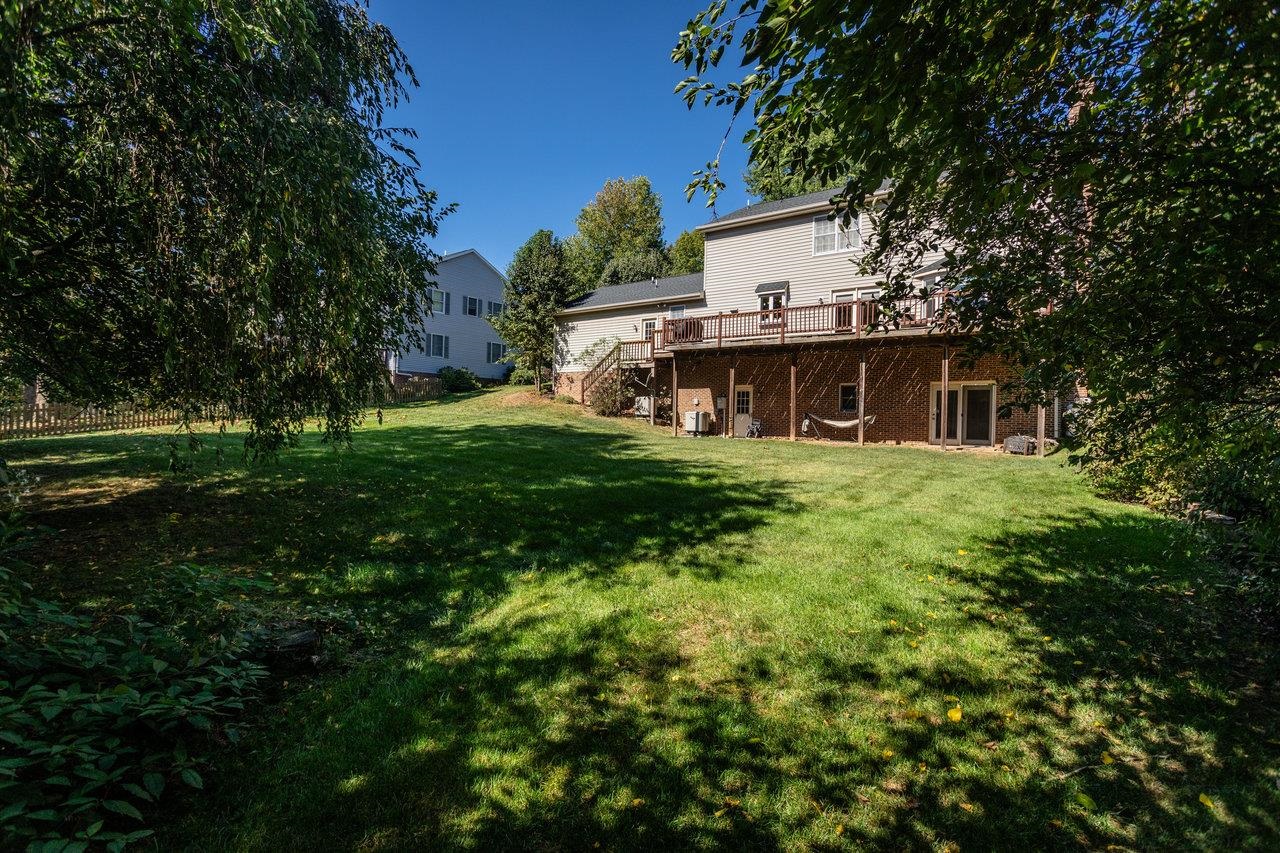 1480 Bluewater Road Harrisonburg, VA 22801 - Photo 45 of 46 a view of a house with a yard porch and sitting area