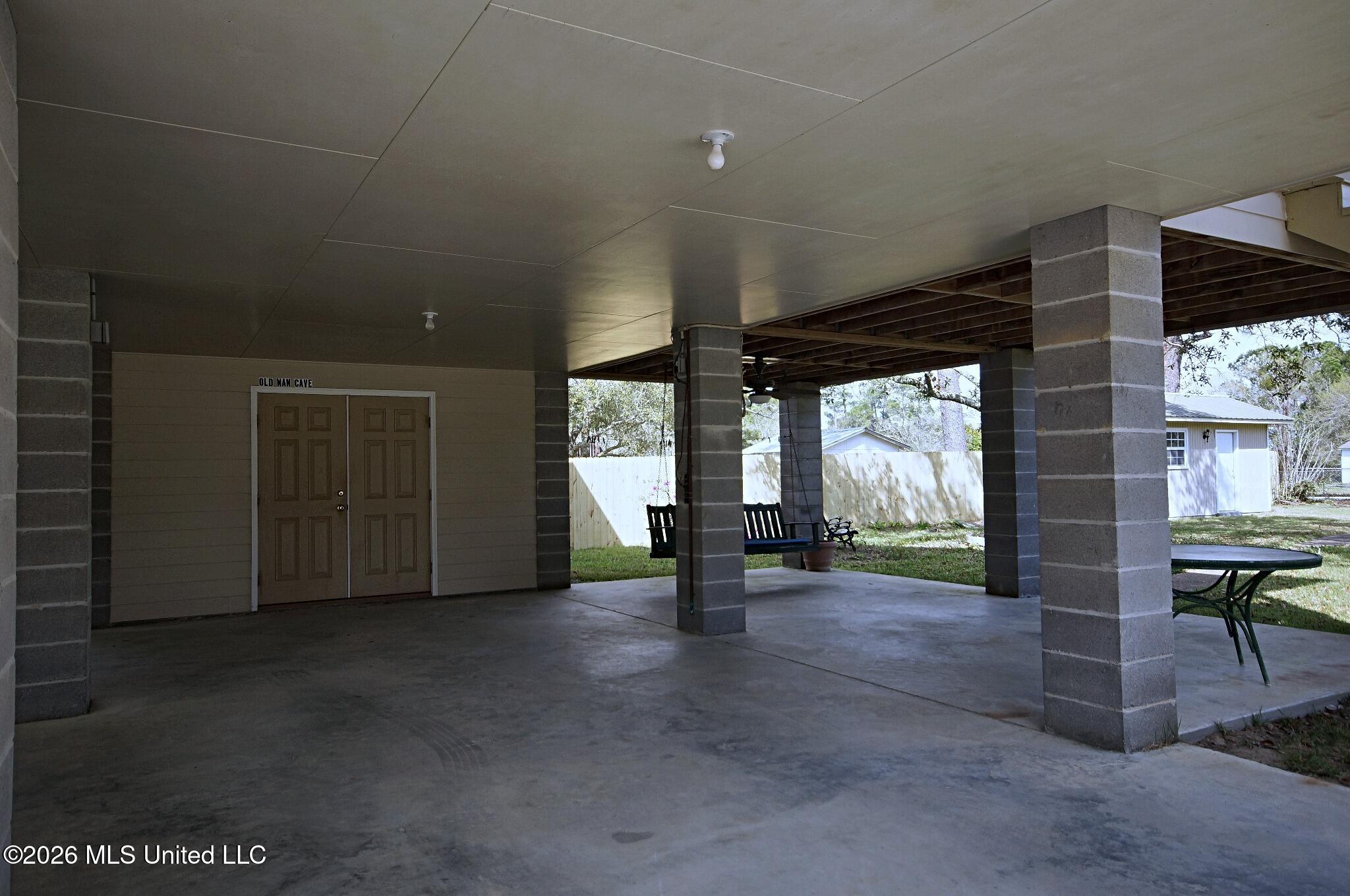6008 St Martin Road Biloxi, MS 39532 - Photo 29 of 39 Carport and tool room under home