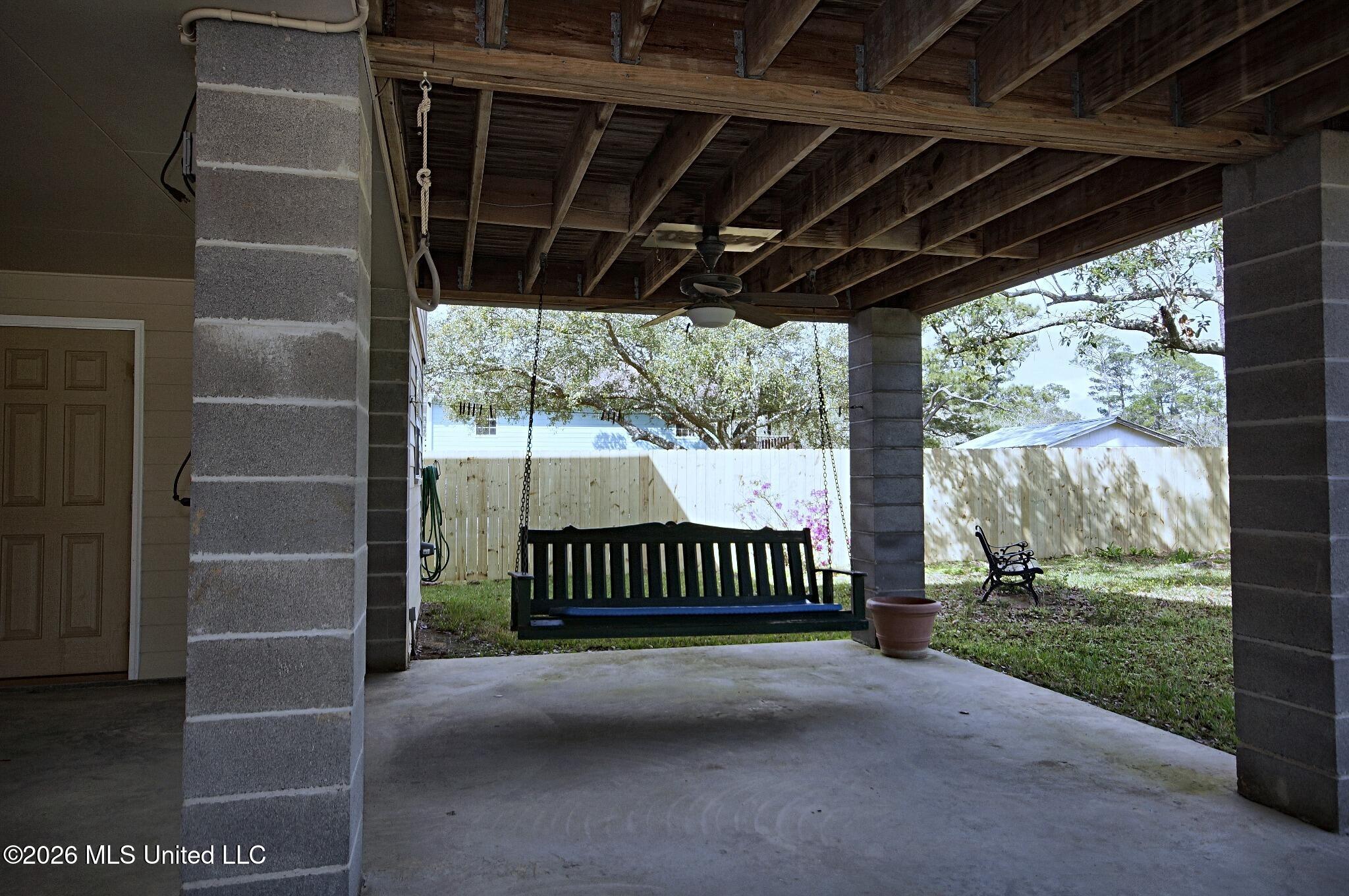 6008 St Martin Road Biloxi, MS 39532 - Photo 30 of 39 Carport and swing under home