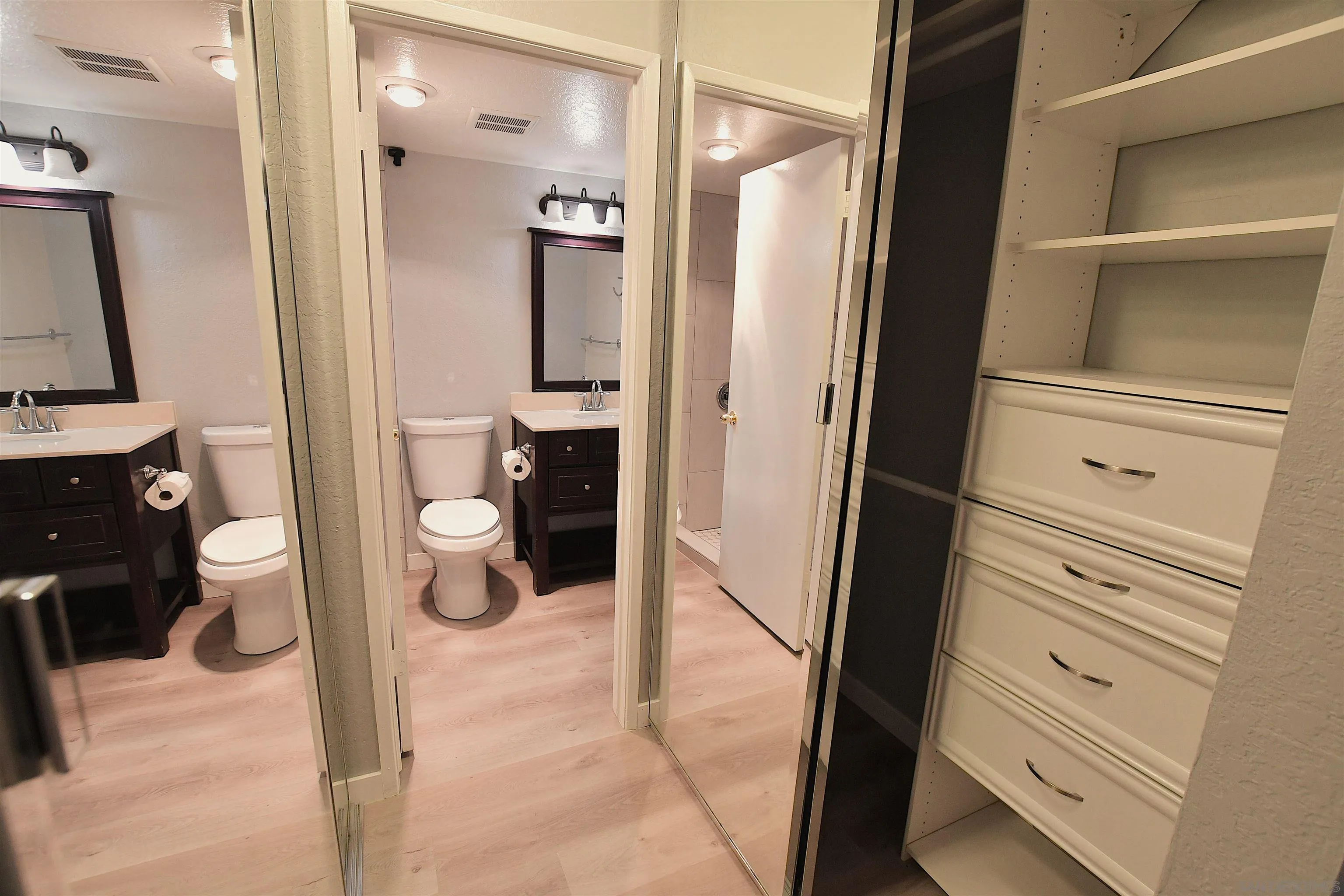 20702 El Toro Road, Unit 258 Lake Forest, CA 92630 - Photo 18 of 30 a bathroom with a toilet and a shower