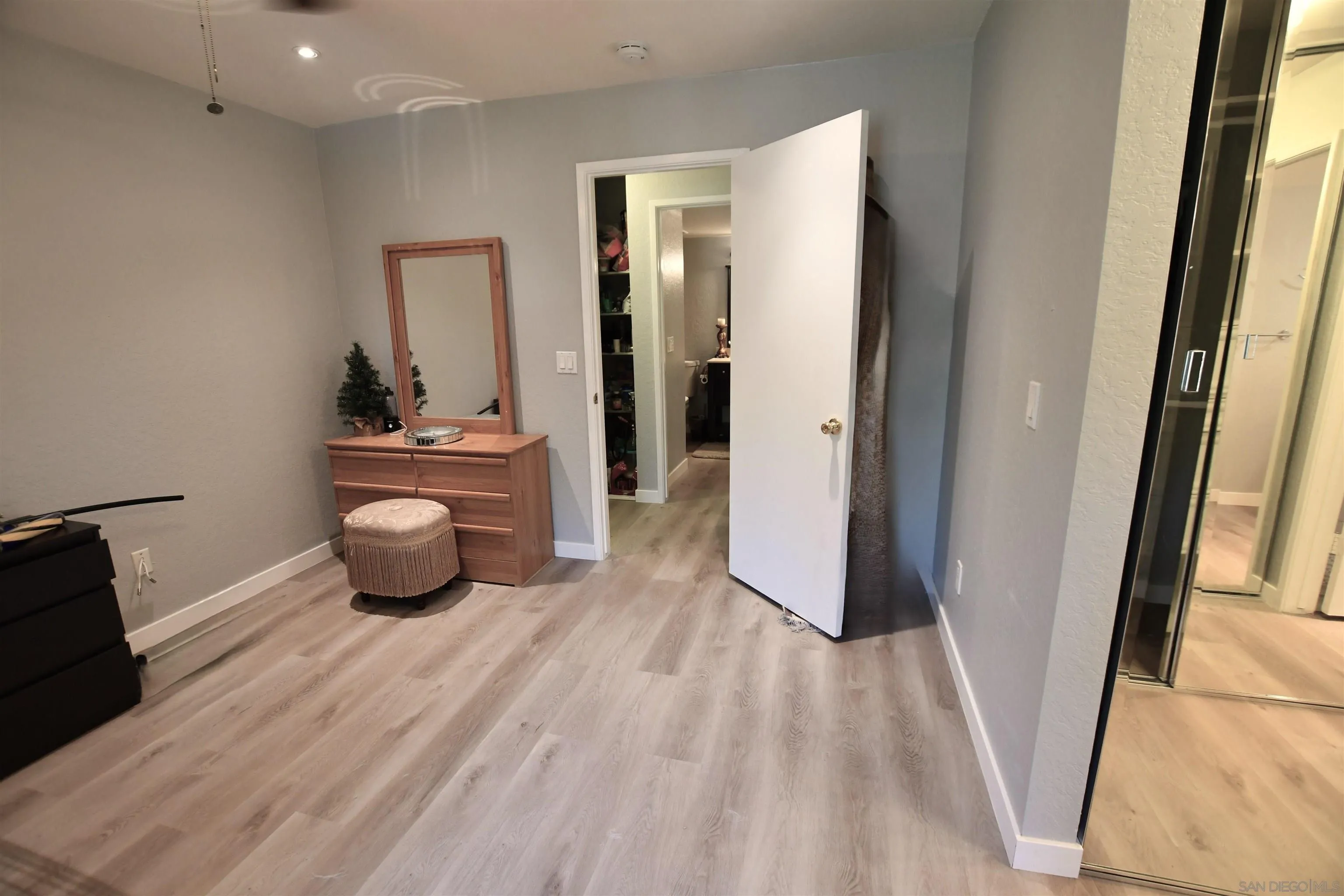 20702 El Toro Road, Unit 258 Lake Forest, CA 92630 - Photo 20 of 30 a view of an empty room and wooden floor