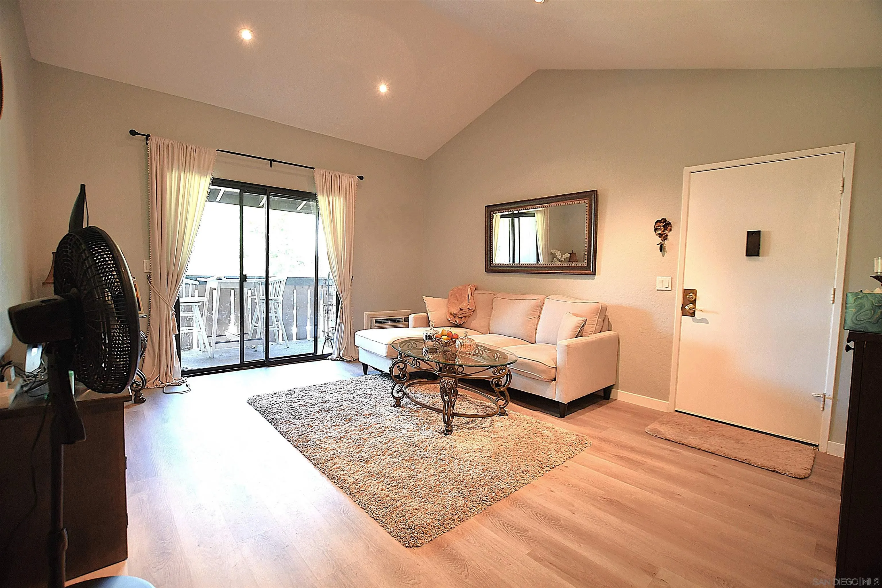 20702 El Toro Road, Unit 258 Lake Forest, CA 92630 - Photo 2 of 30 a living room with furniture and a window