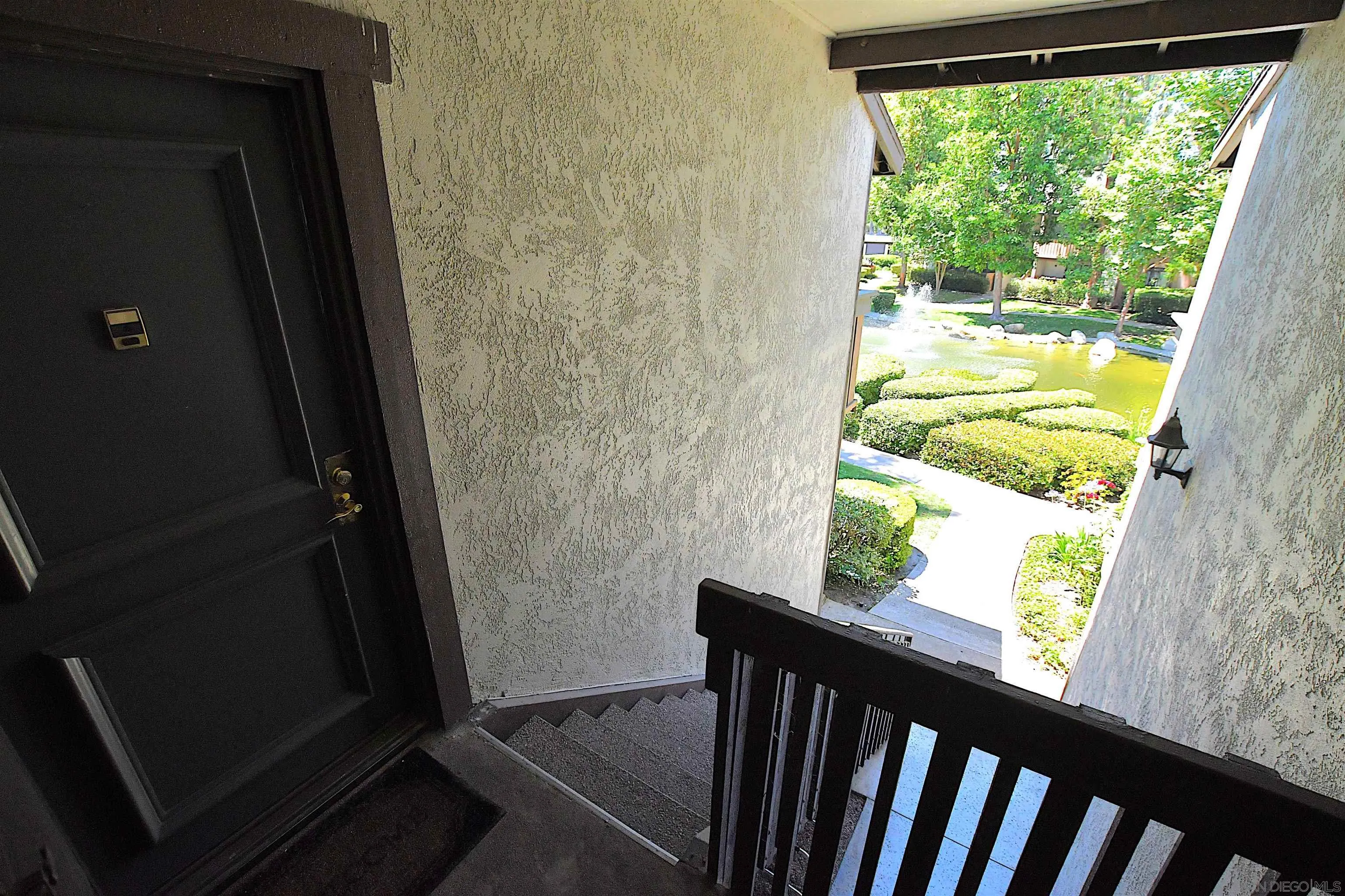 20702 El Toro Road, Unit 258 Lake Forest, CA 92630 - Photo 25 of 30 a view of a balcony with wooden floor