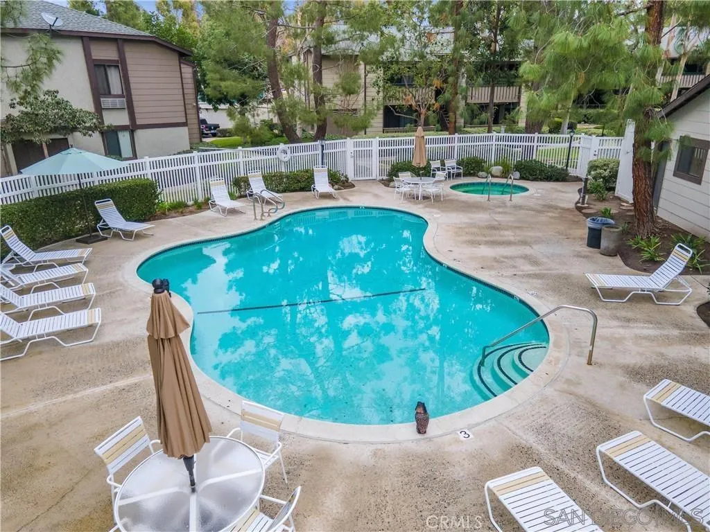 20702 El Toro Road, Unit 258 Lake Forest, CA 92630 - Photo 29 of 30 a view of a swimming pool with a patio