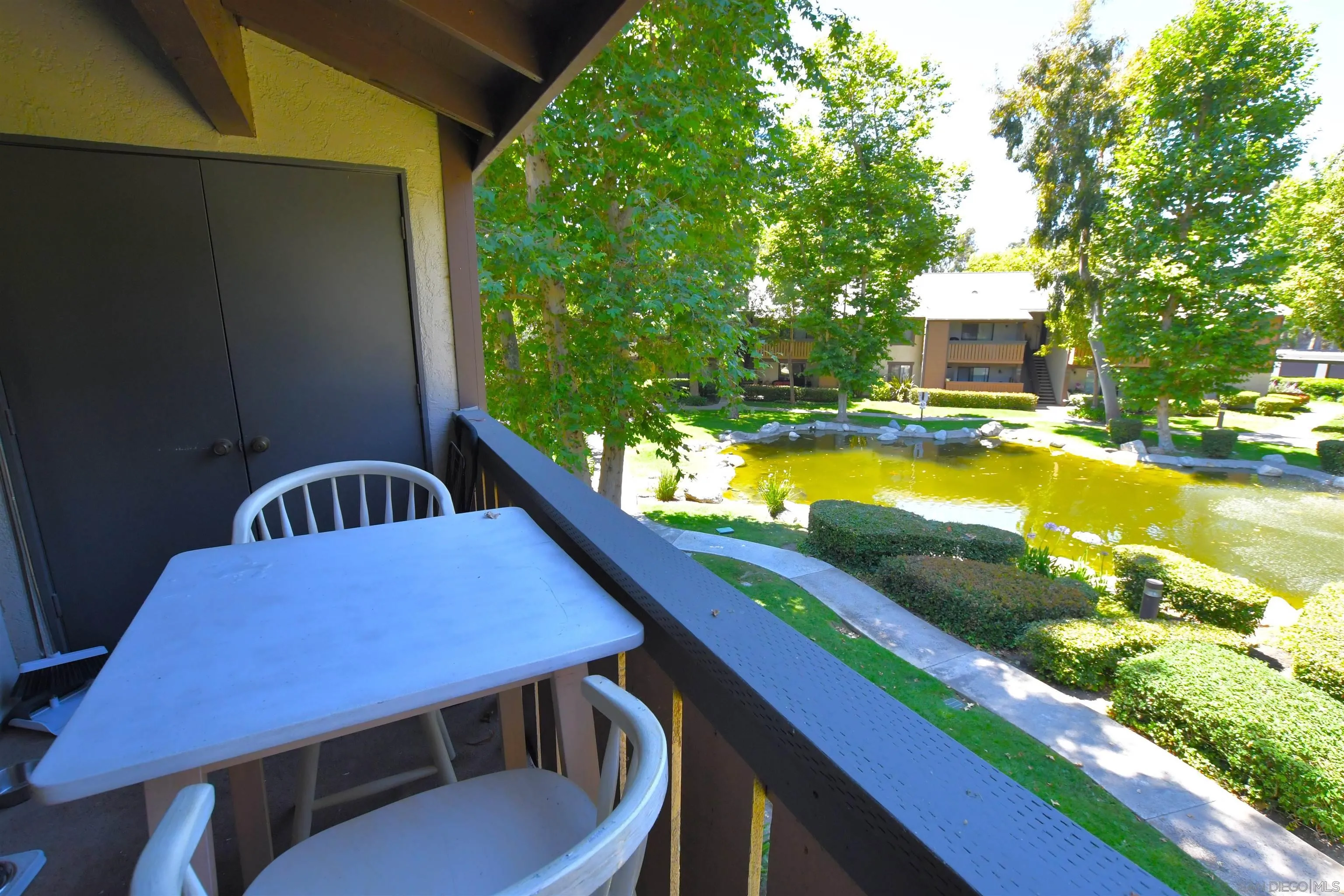 20702 El Toro Road, Unit 258 Lake Forest, CA 92630 - Photo 7 of 30 a view of a swimming pool with a seating space