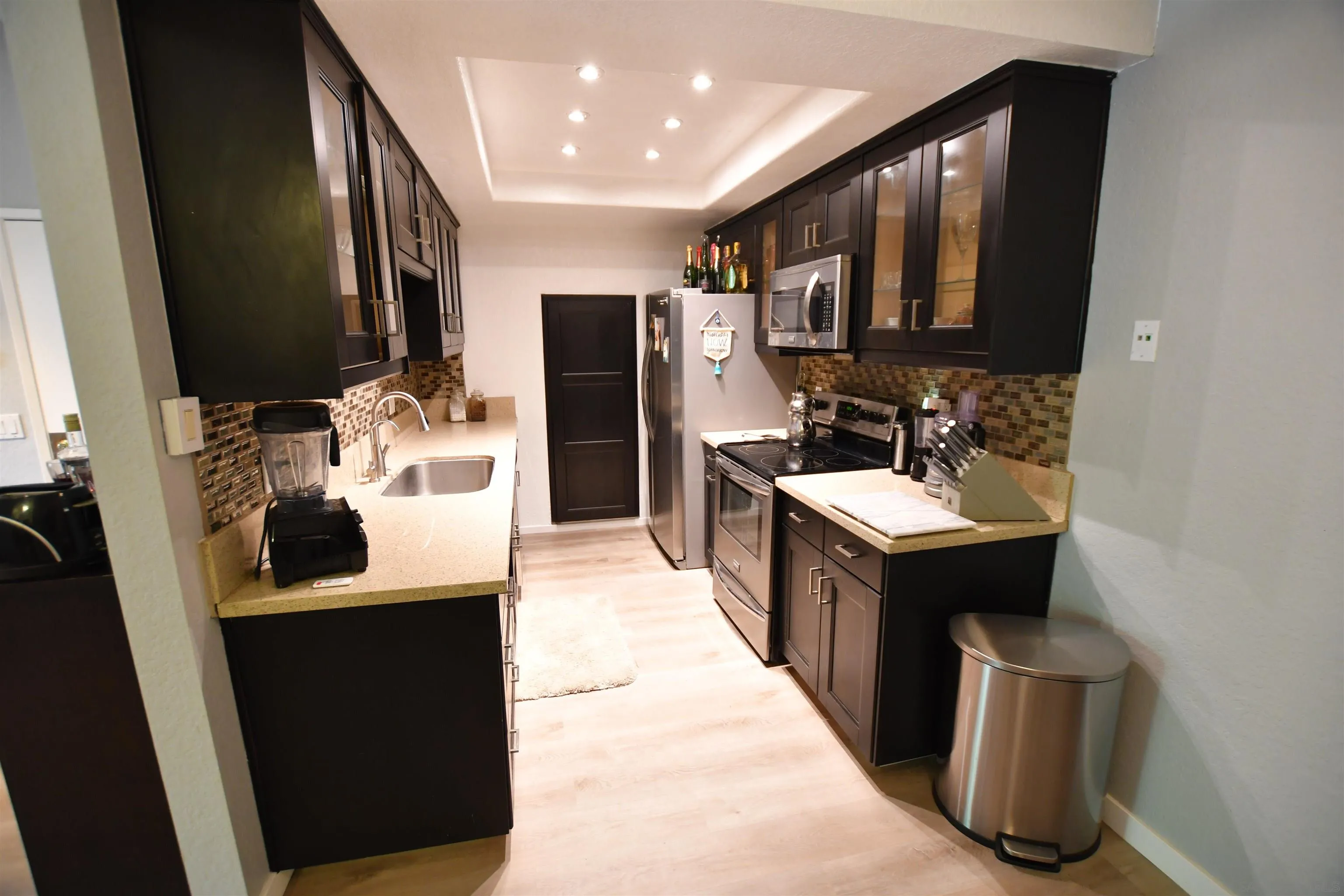 20702 El Toro Road, Unit 258 Lake Forest, CA 92630 - Photo 9 of 30 a bathroom with sink a vanity and shower