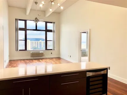 a bathroom with a sink and a window