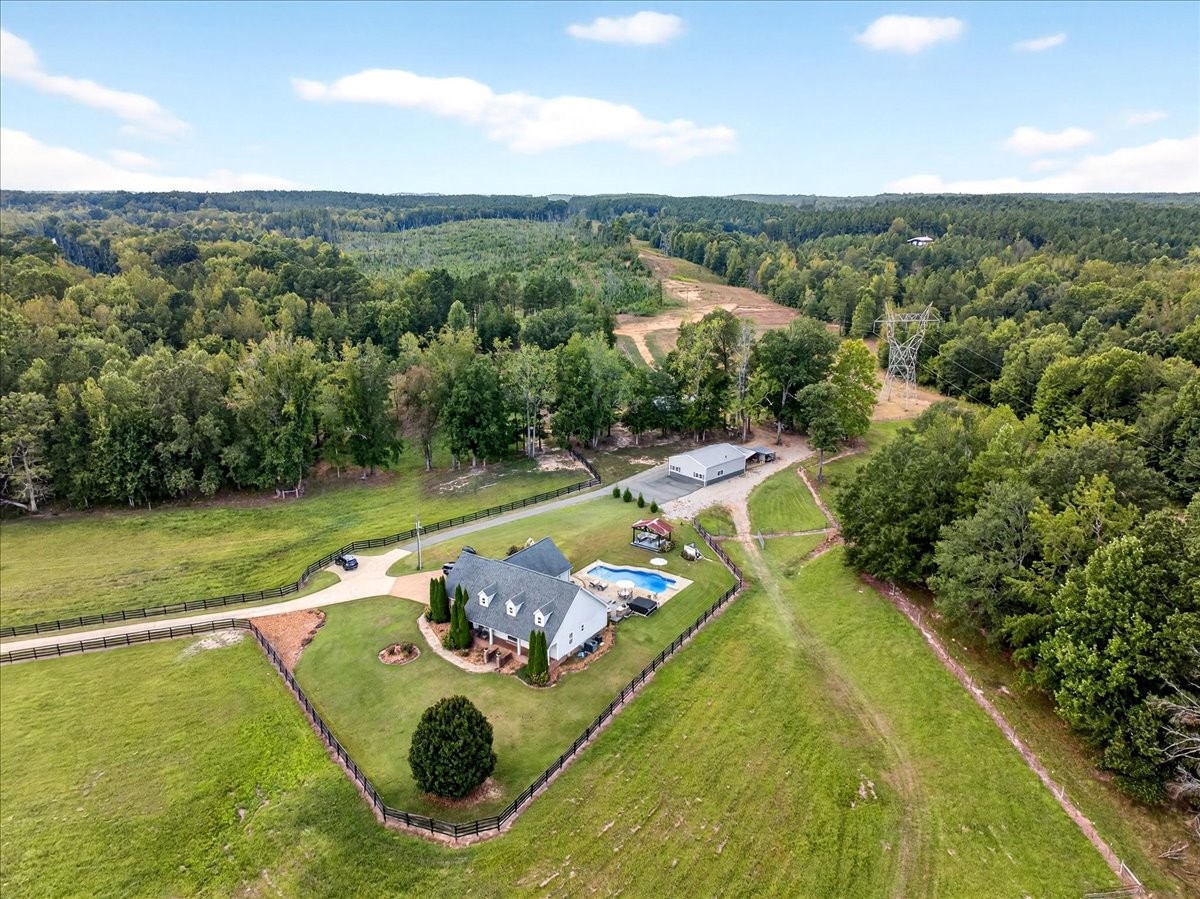 7225 Highway 57 Ramer, TN 38367 - Photo 1 of 68 an aerial view of a house with a swimming pool