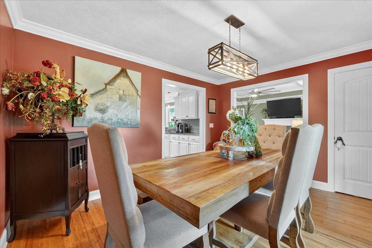 7225 Highway 57 Ramer, TN 38367 - Photo 11 of 68 a view of a dining room with furniture window and wooden floor