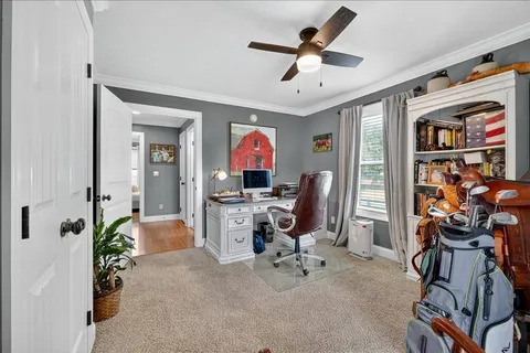 a view of a workspace with furniture and a livingroom