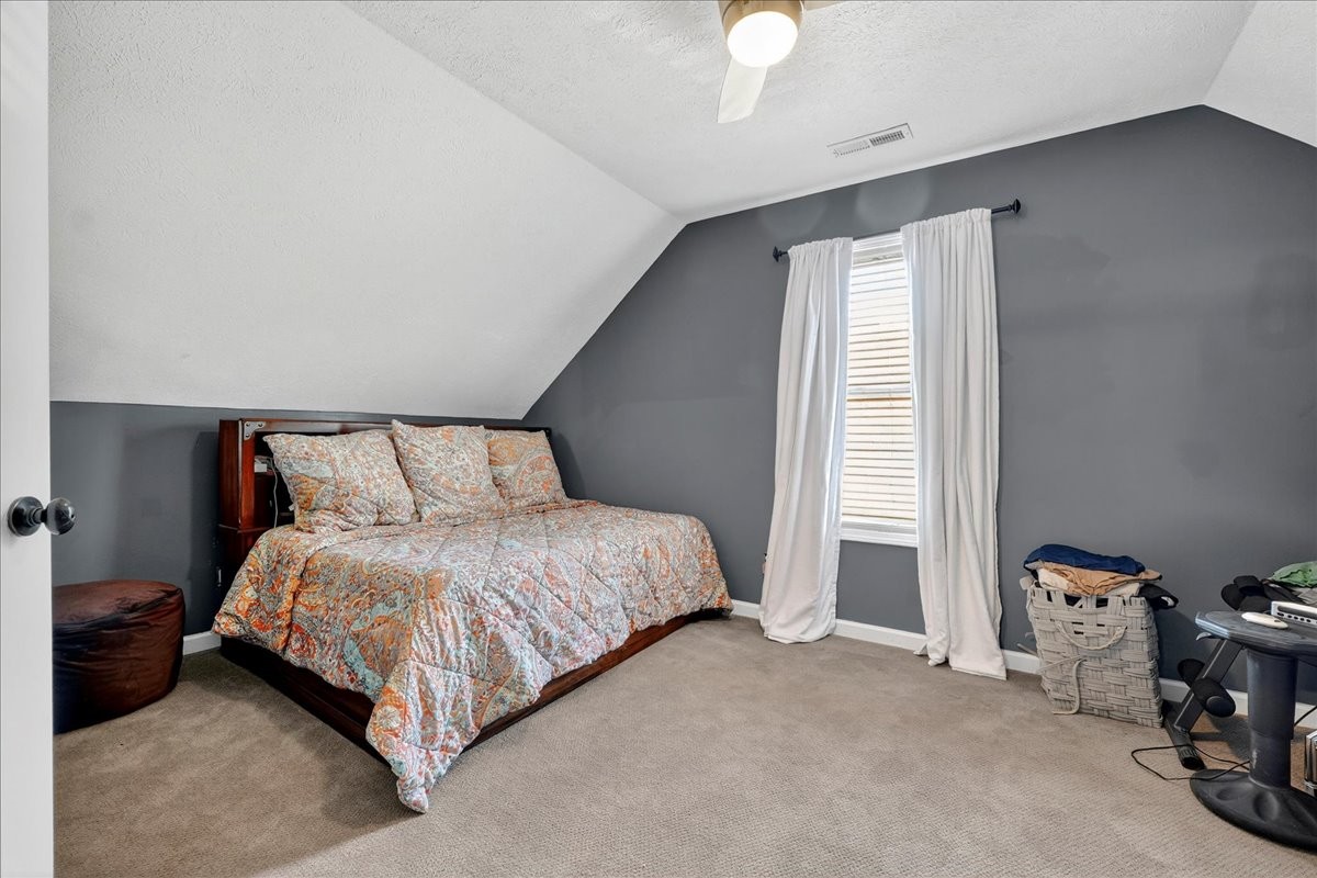 7225 Highway 57 Ramer, TN 38367 - Photo 27 of 68 a bedroom with a bed and a window