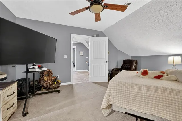 a view of a swimming pool with an outdoor space and seating area