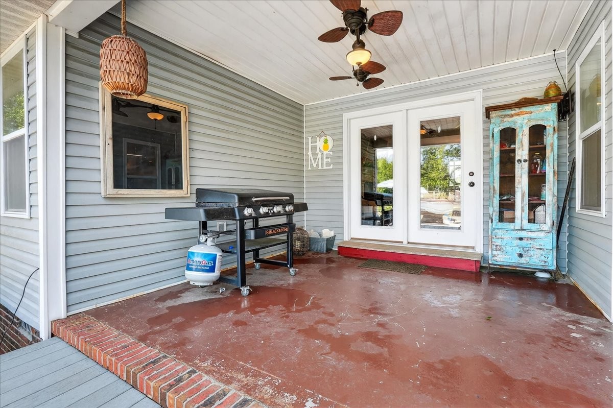 7225 Highway 57 Ramer, TN 38367 - Photo 35 of 68 a view of a lounge chair in the back yard of the house