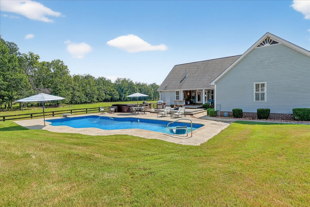 7225 Highway 57 Ramer, TN 38367 - Photo 40 of 68 a view of pool with umbrella