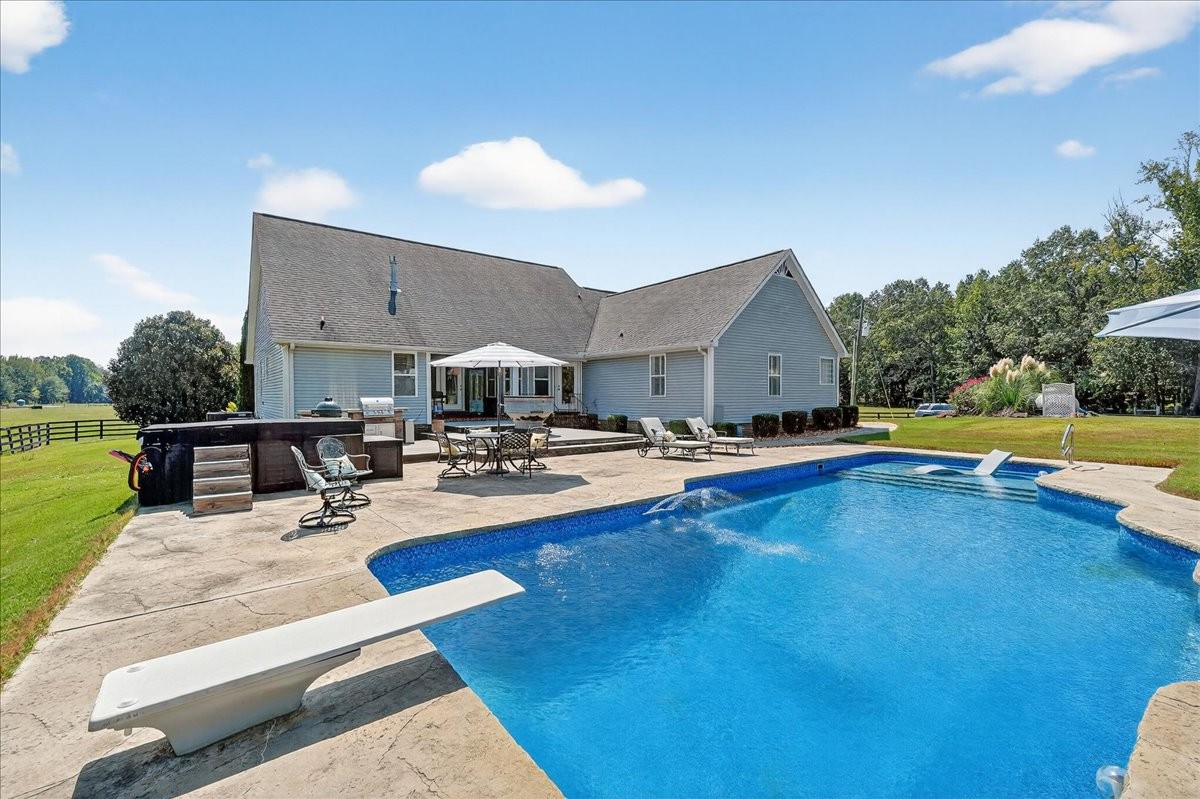 7225 Highway 57 Ramer, TN 38367 - Photo 43 of 68 a view of a patio with swimming pool table and chairs