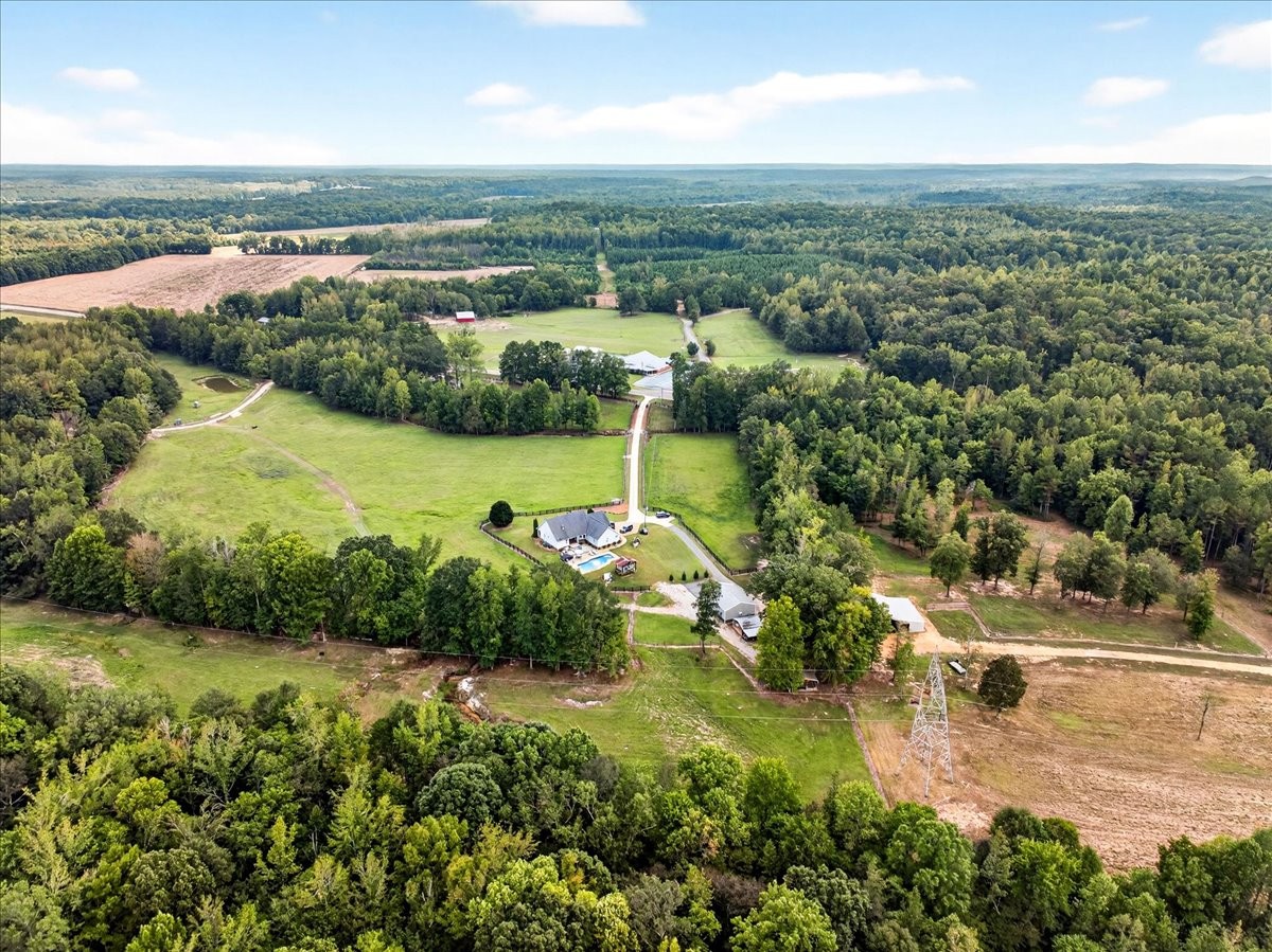 7225 Highway 57 Ramer, TN 38367 - Photo 66 of 68 an aerial view of residential houses with outdoor space and river