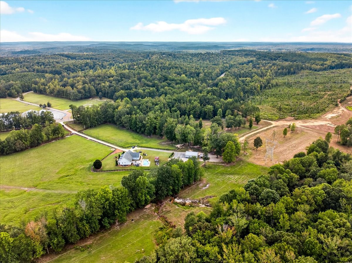 7225 Highway 57 Ramer, TN 38367 - Photo 67 of 68 an aerial view of residential houses with outdoor space and trees