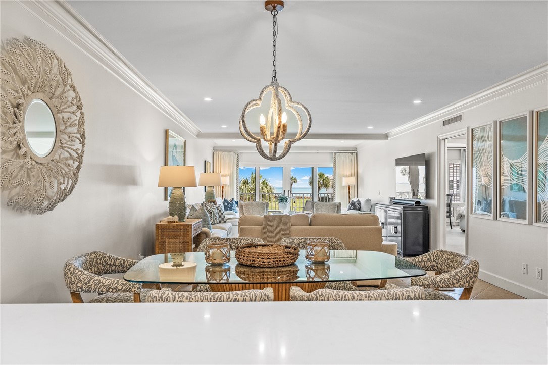 550 Beach Road, Unit 223 Vero Beach, FL 32963 - Photo 18 of 36 a view of dining room and hall with furniture