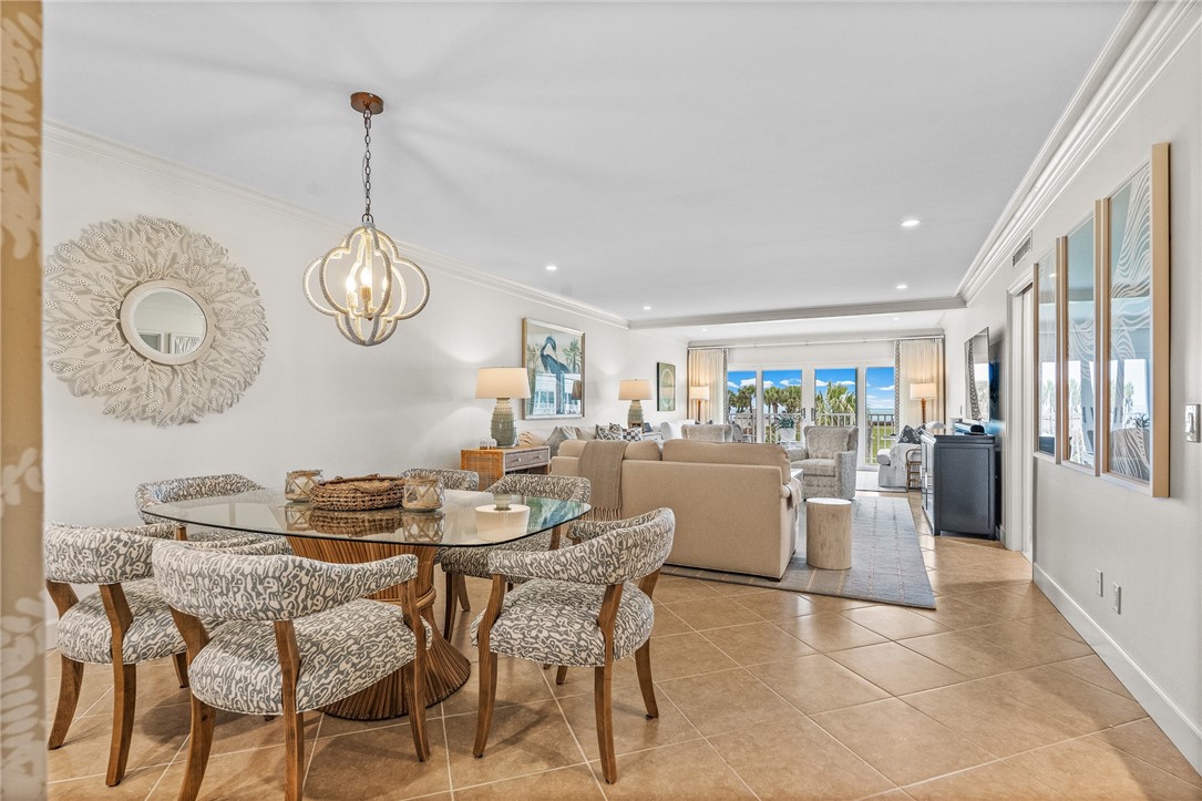 550 Beach Road, Unit 223 Vero Beach, FL 32963 - Photo 20 of 36 a dining area with a table and chairs