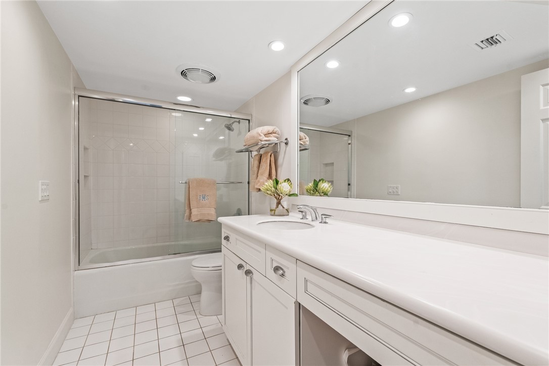 550 Beach Road, Unit 223 Vero Beach, FL 32963 - Photo 24 of 36 a bathroom with a sink a toilet and shower