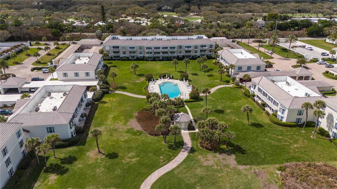 550 Beach Road, Unit 223 Vero Beach, FL 32963 - Photo 30 of 36 an aerial view of residential houses with outdoor space and swimming pool