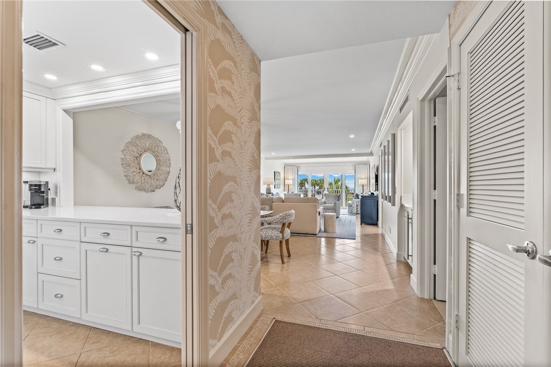 550 Beach Road, Unit 223 Vero Beach, FL 32963 - Photo 5 of 36 a view of a hallway and dining room