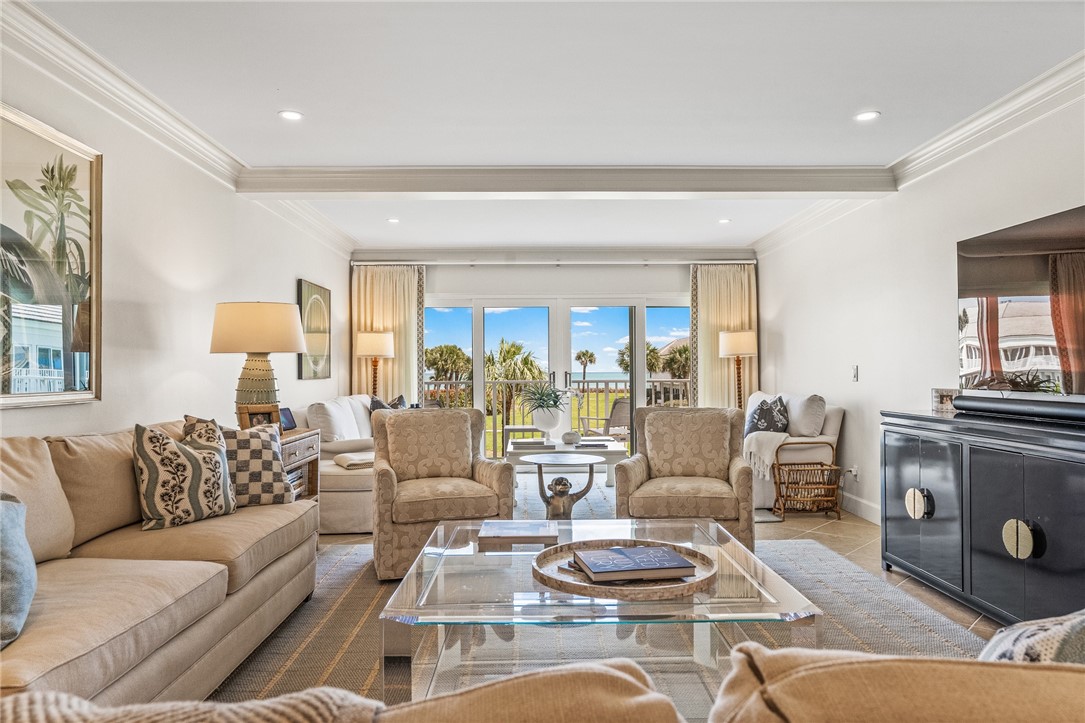 550 Beach Road, Unit 223 Vero Beach, FL 32963 - Photo 6 of 36 a living room with furniture and a fireplace