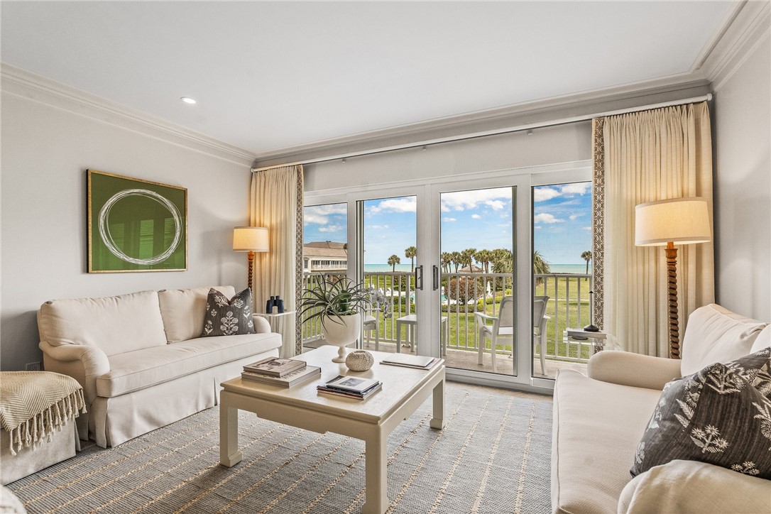550 Beach Road, Unit 223 Vero Beach, FL 32963 - Photo 7 of 36 a living room with furniture and a large window
