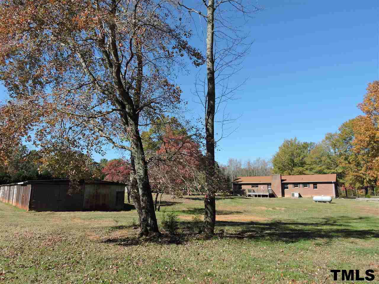 5119 Green Riley Road Rougemont, NC 27572 - Photo 16 of 25 a front view of a house with a yard