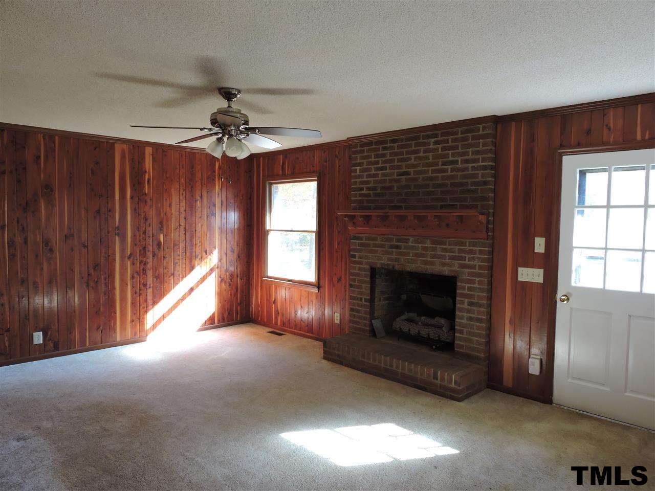 5119 Green Riley Road Rougemont, NC 27572 - Photo 3 of 25 a living room with furniture and a fireplace