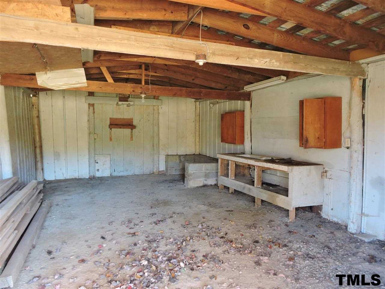 5119 Green Riley Road Rougemont, NC 27572 - Photo 23 of 25 a view of a room with wooden walls