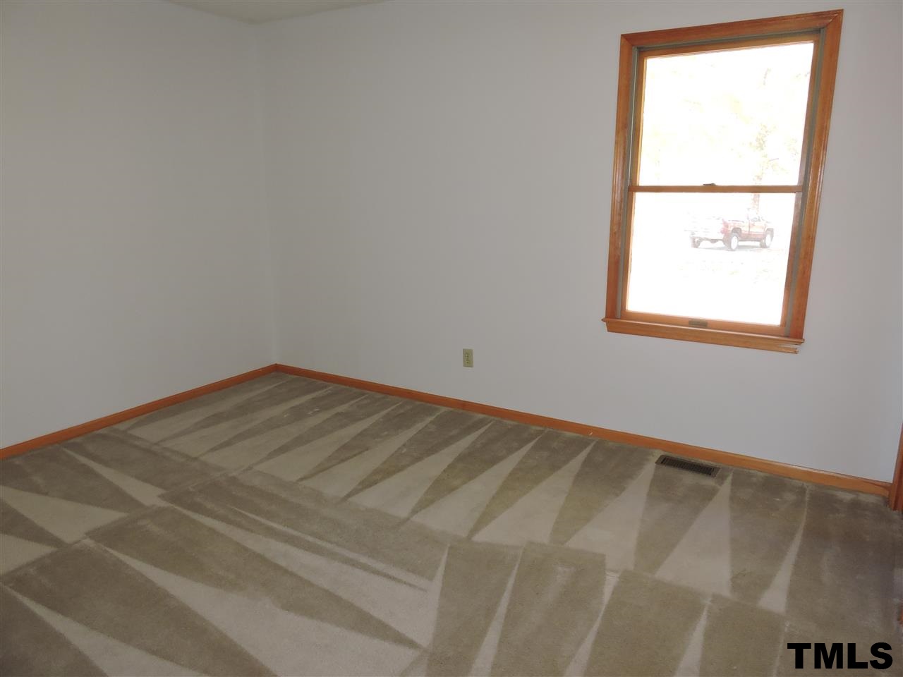 5119 Green Riley Road Rougemont, NC 27572 - Photo 9 of 25 an empty room with a window