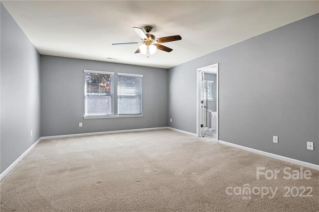 6170 Durango Way Denver, NC 28037 - Photo 19 of 38 a view of an empty room with a window