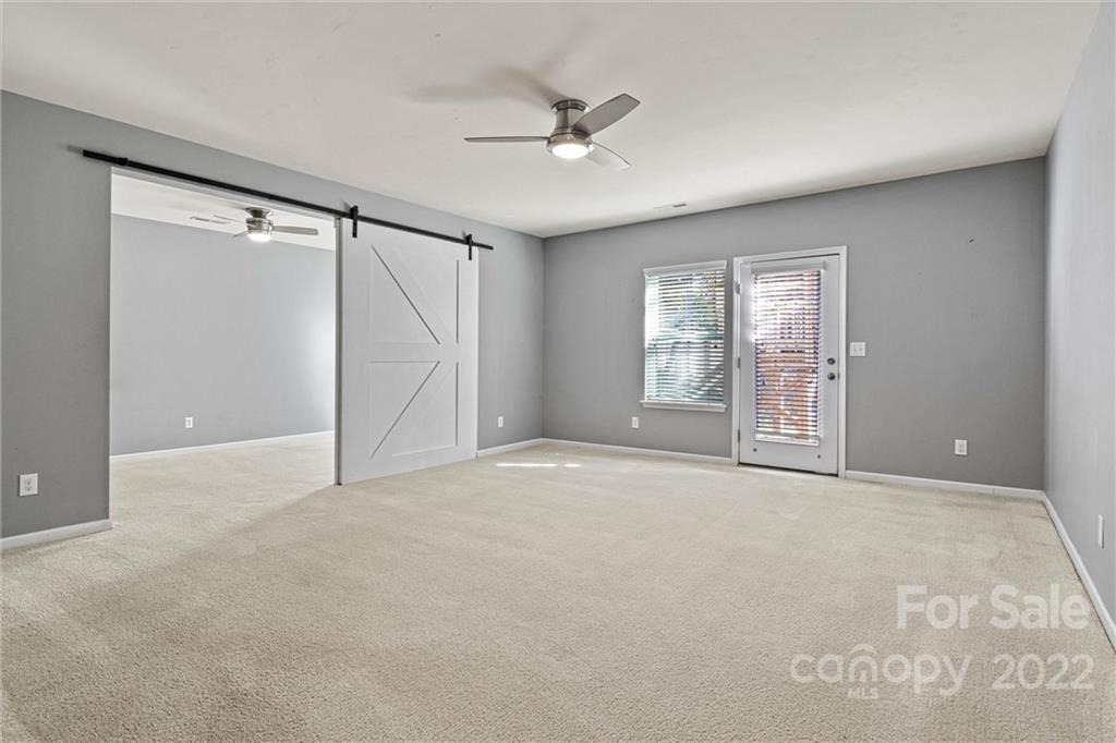 6170 Durango Way Denver, NC 28037 - Photo 22 of 38 a view of an empty room with a window