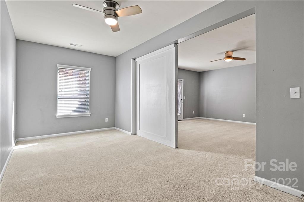 6170 Durango Way Denver, NC 28037 - Photo 24 of 38 a view of an empty room with a window