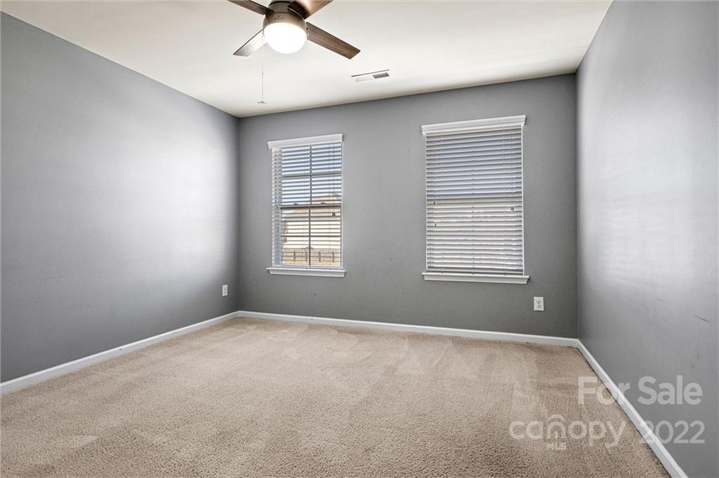 6170 Durango Way Denver, NC 28037 - Photo 27 of 38 a view of wooden floor and windows in a room