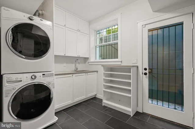 a utility room with dryer and washer