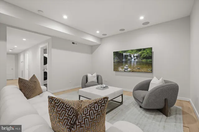 a living room with furniture and a couch