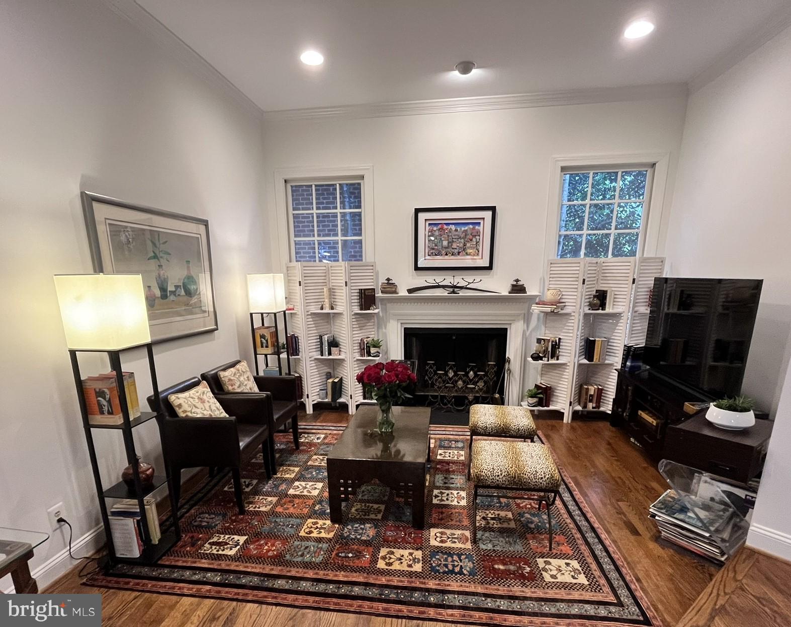 7809 Fox Gate Court Bethesda, MD 20817 - Photo 12 of 42 a living room with furniture and a fireplace