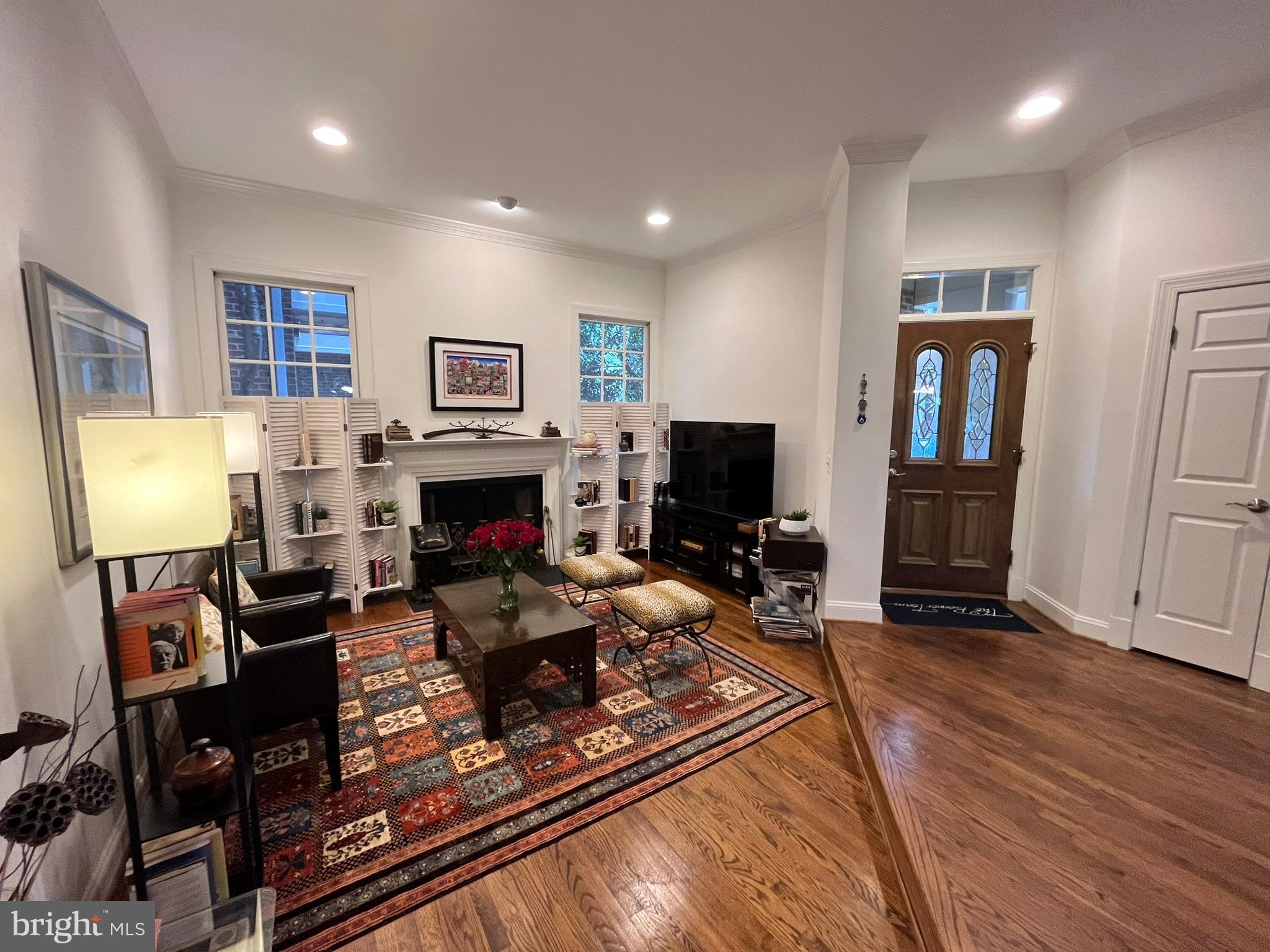 7809 Fox Gate Court Bethesda, MD 20817 - Photo 13 of 42 a living room with furniture and a fireplace