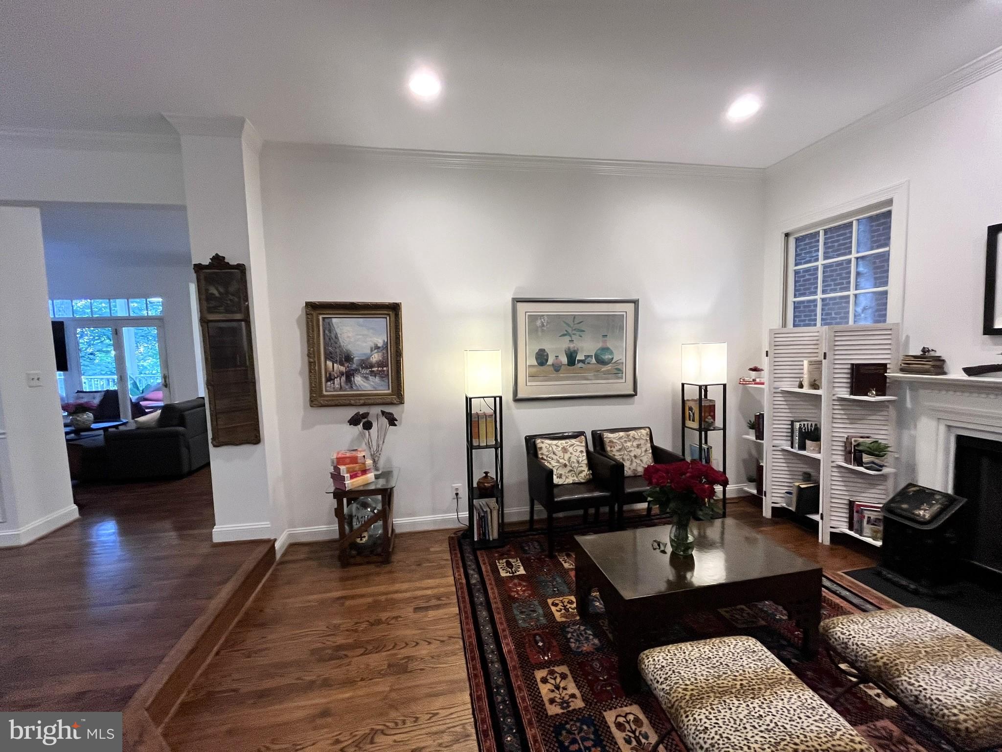 7809 Fox Gate Court Bethesda, MD 20817 - Photo 14 of 42 a living room with furniture and a wooden floor