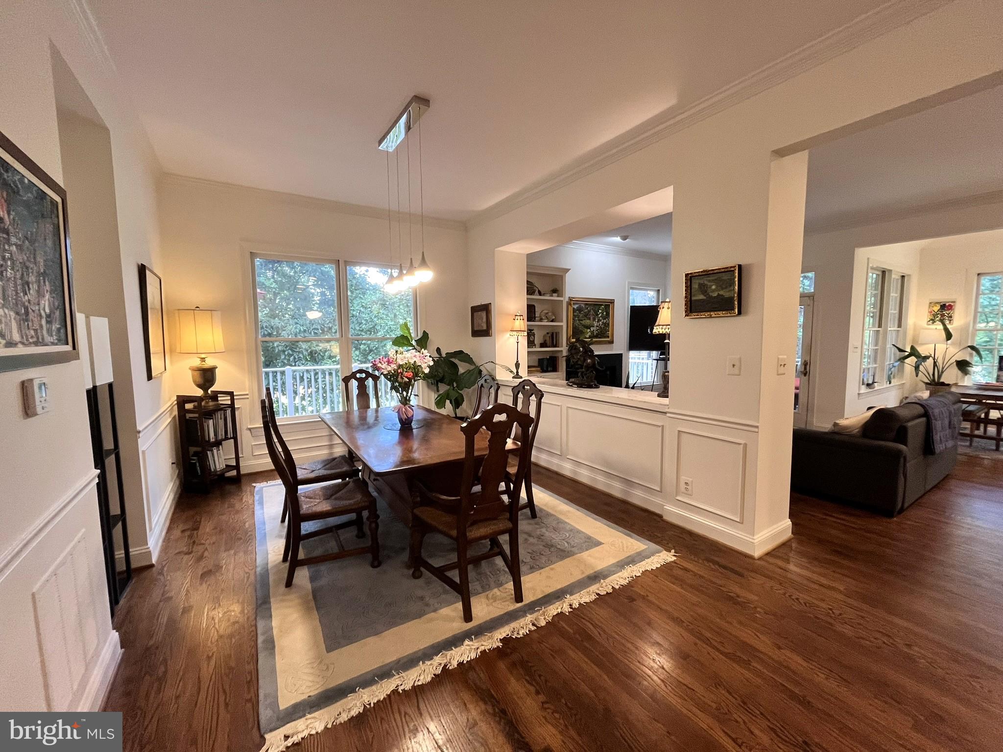 7809 Fox Gate Court Bethesda, MD 20817 - Photo 15 of 42 a view of a dining room with furniture and wooden floor