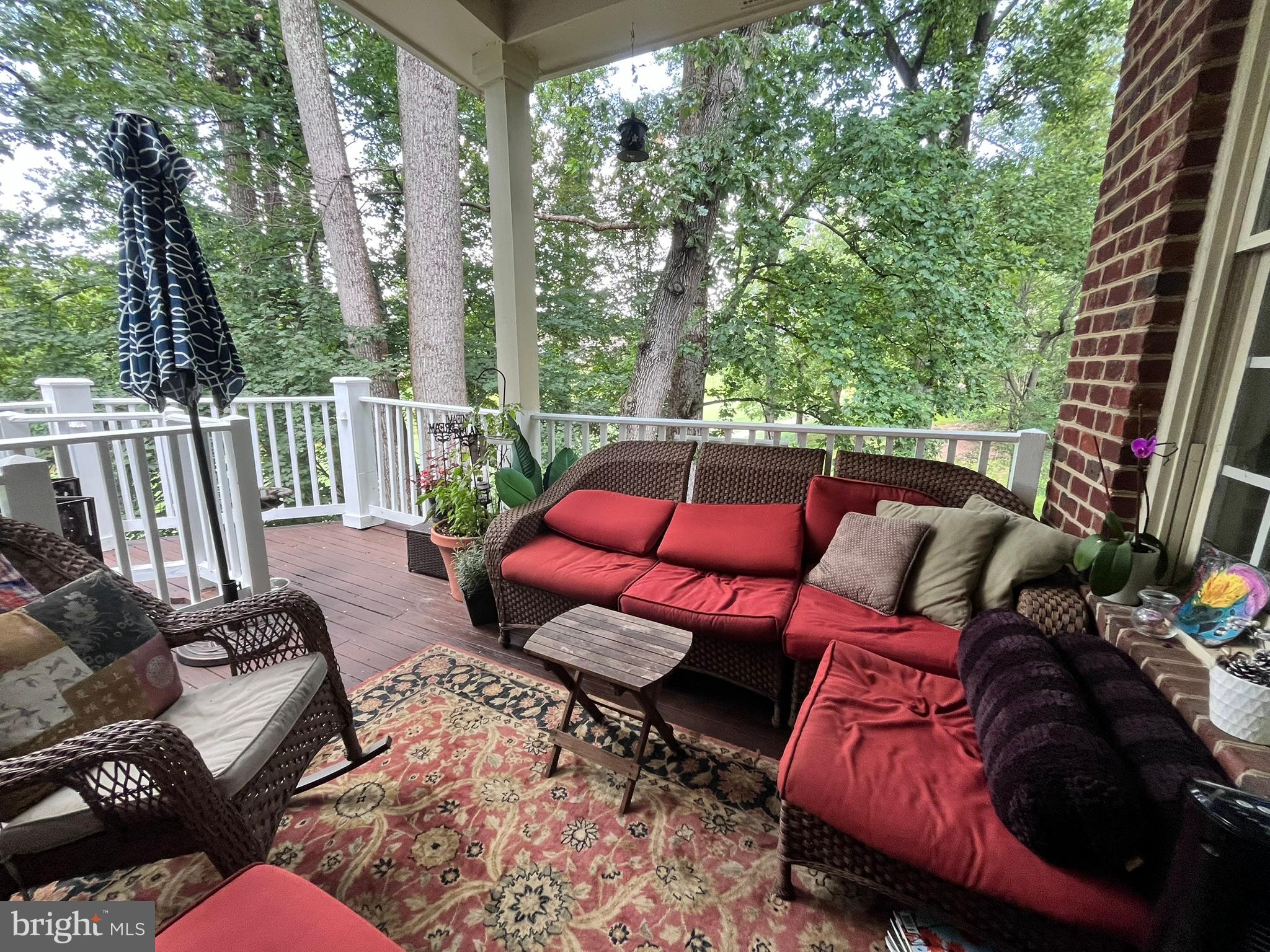 7809 Fox Gate Court Bethesda, MD 20817 - Photo 16 of 42 a outdoor living space with furniture and garden view