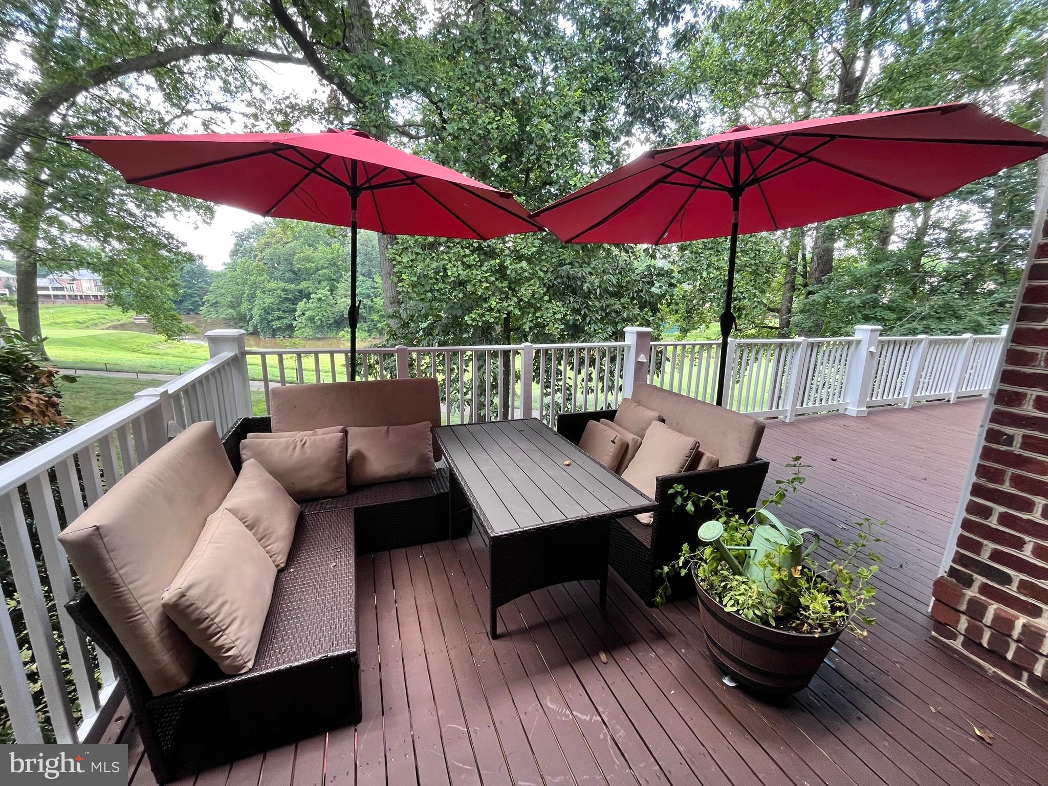 7809 Fox Gate Court Bethesda, MD 20817 - Photo 18 of 42 a view of a patio with furniture and wooden floor