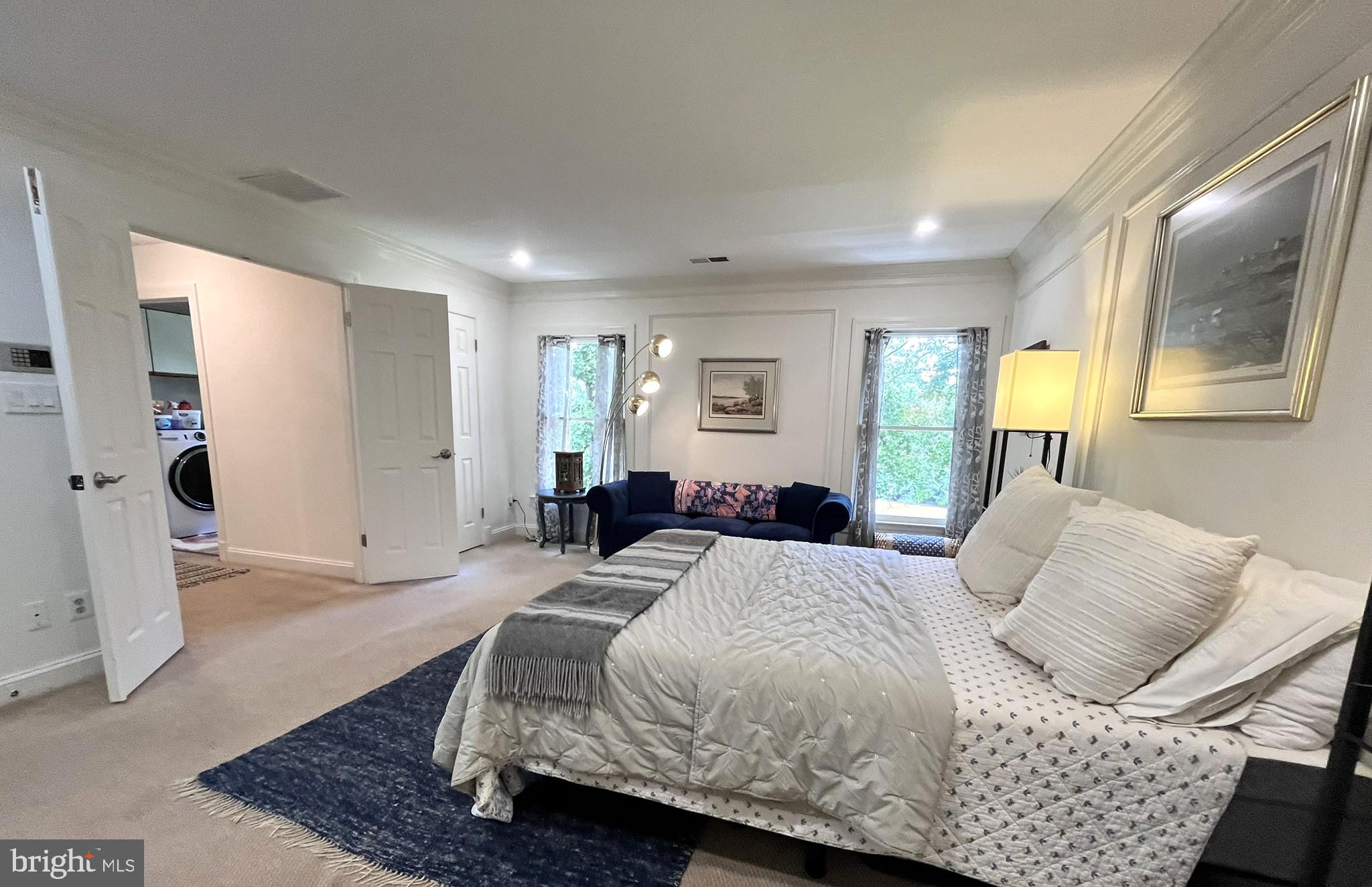 7809 Fox Gate Court Bethesda, MD 20817 - Photo 21 of 42 a bedroom with a large bed and a window
