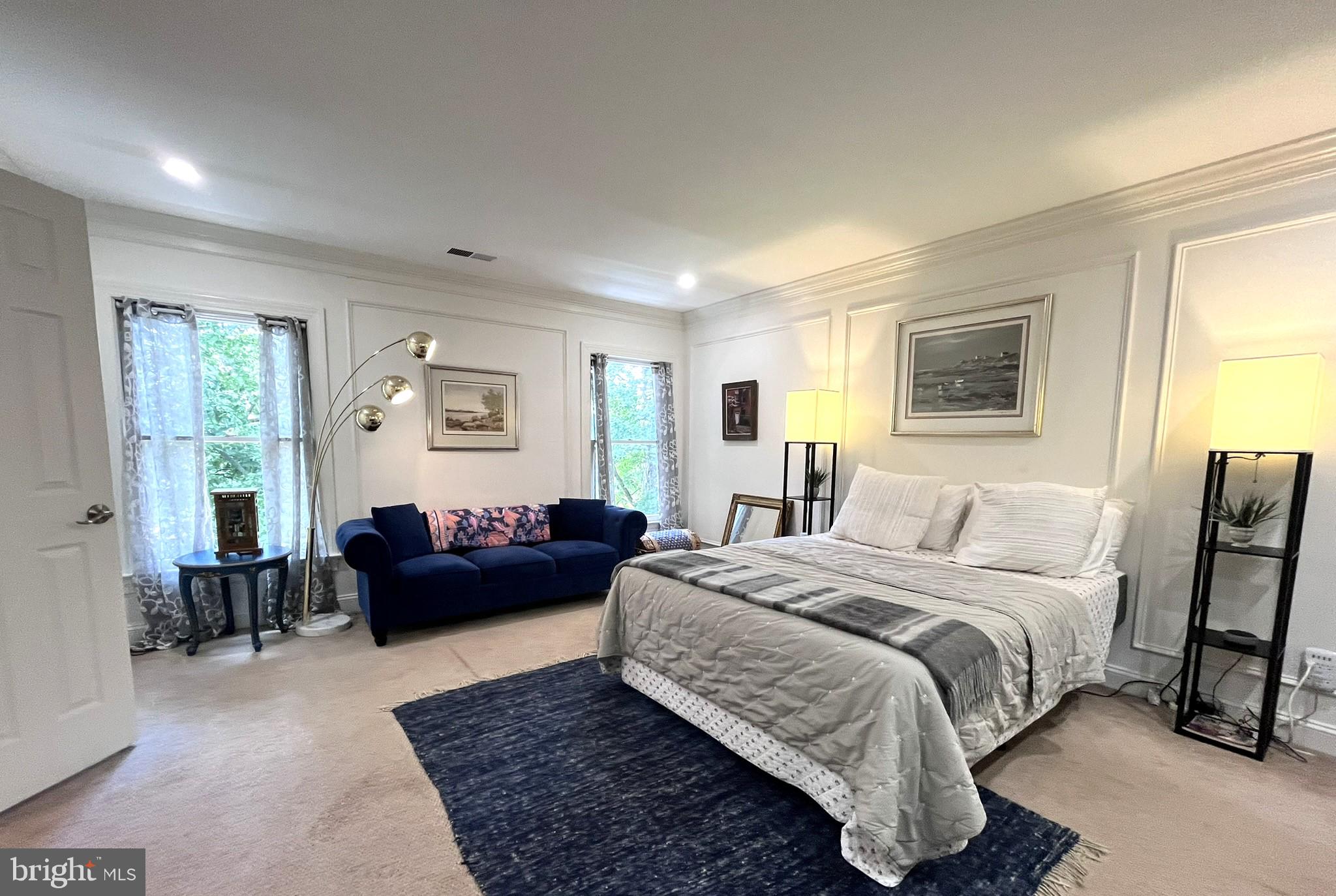 7809 Fox Gate Court Bethesda, MD 20817 - Photo 22 of 42 a bedroom with a bed couch and a window
