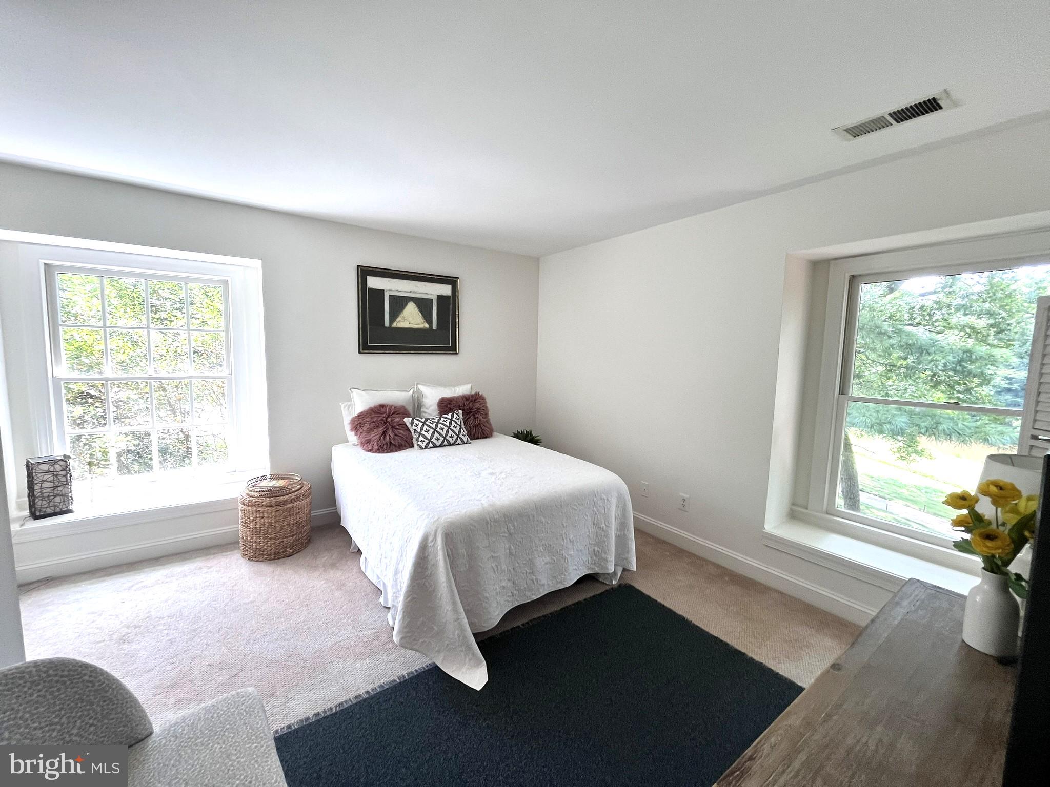 7809 Fox Gate Court Bethesda, MD 20817 - Photo 28 of 42 a bedroom with a bed and a window