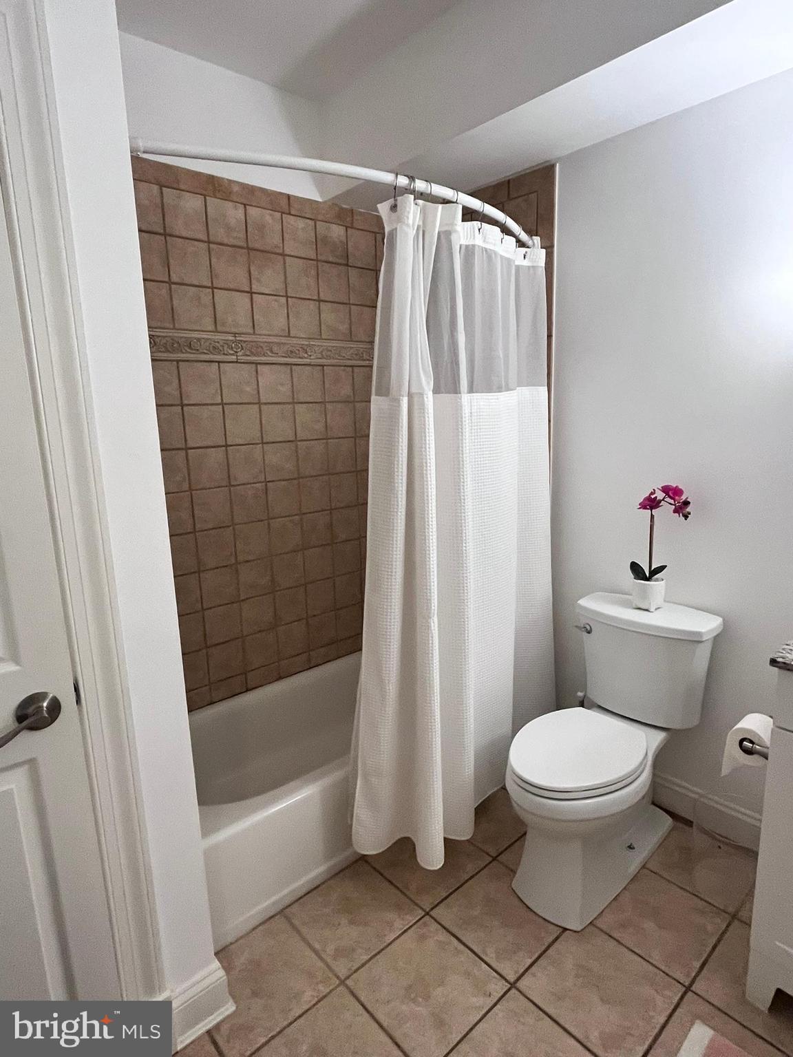 7809 Fox Gate Court Bethesda, MD 20817 - Photo 33 of 42 a bathroom with a toilet and a shower