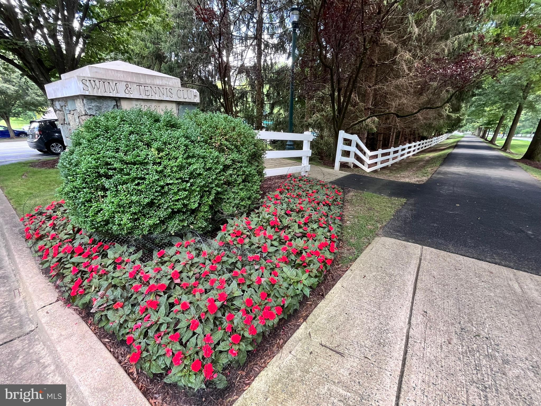 7809 Fox Gate Court Bethesda, MD 20817 - Photo 36 of 42 a view of a garden with flowers and trees