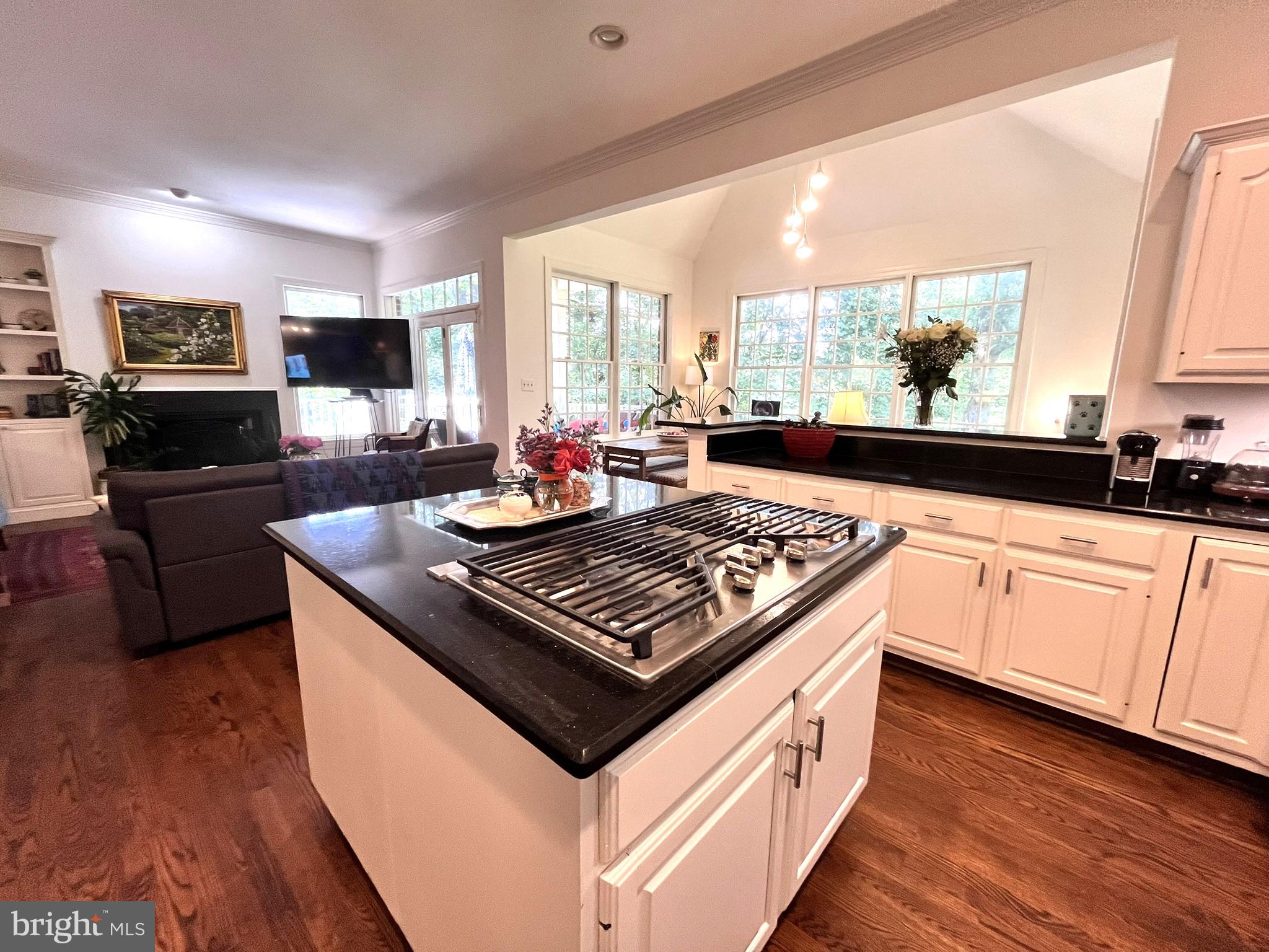 7809 Fox Gate Court Bethesda, MD 20817 - Photo 4 of 42 a kitchen with a stove and a wooden floor
